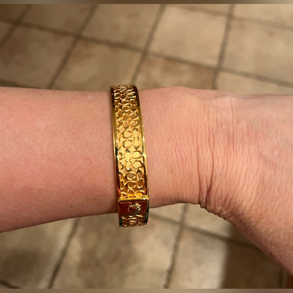 Coach gold tone bangle